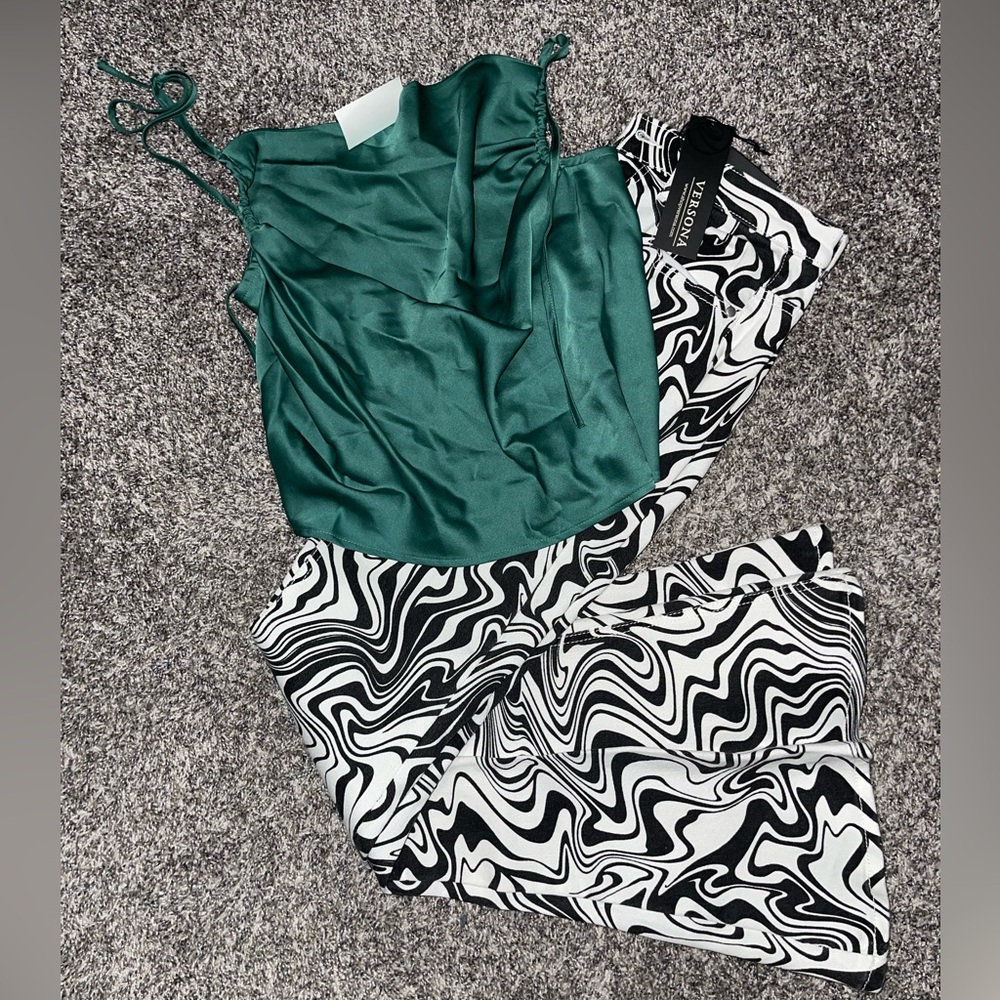 Flare leg pattern, jeans and strapped dressed tin top.Perfect forwestern fashion